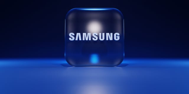 Close-up of a Samsung HBM memory stack with exposed silicon dies and interconnects.