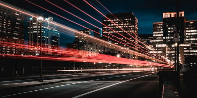 long exposure photography of road and cars