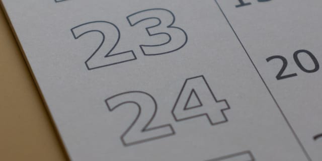 A wall calendar opened to the month of June