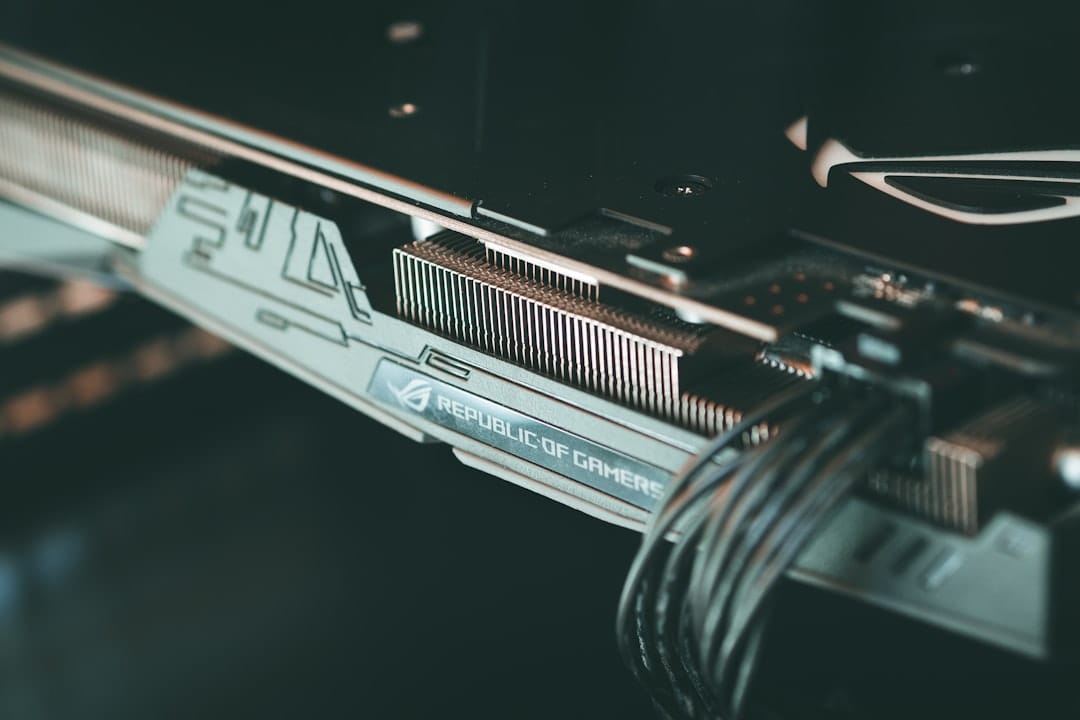 Close-up macro photograph of a GPU circuit board showing copper traces and chip components