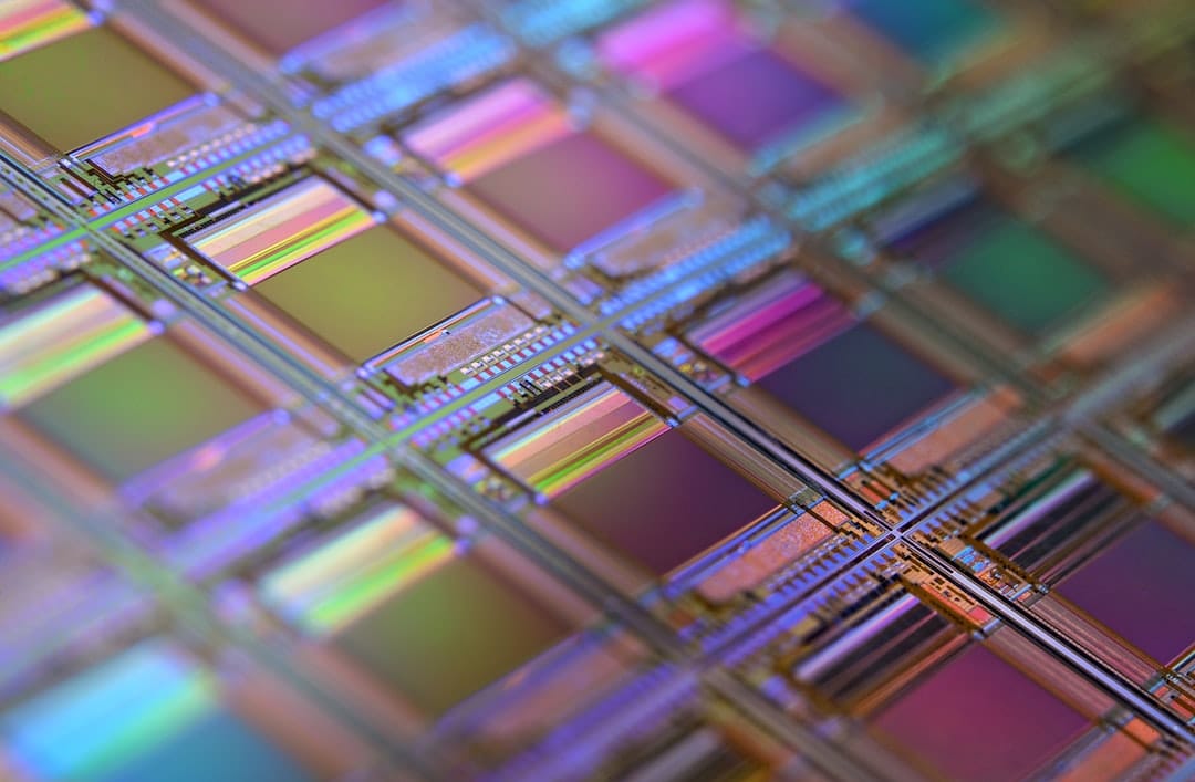 Close-up of a server processor chip with visible die and pins on a dark circuit board.